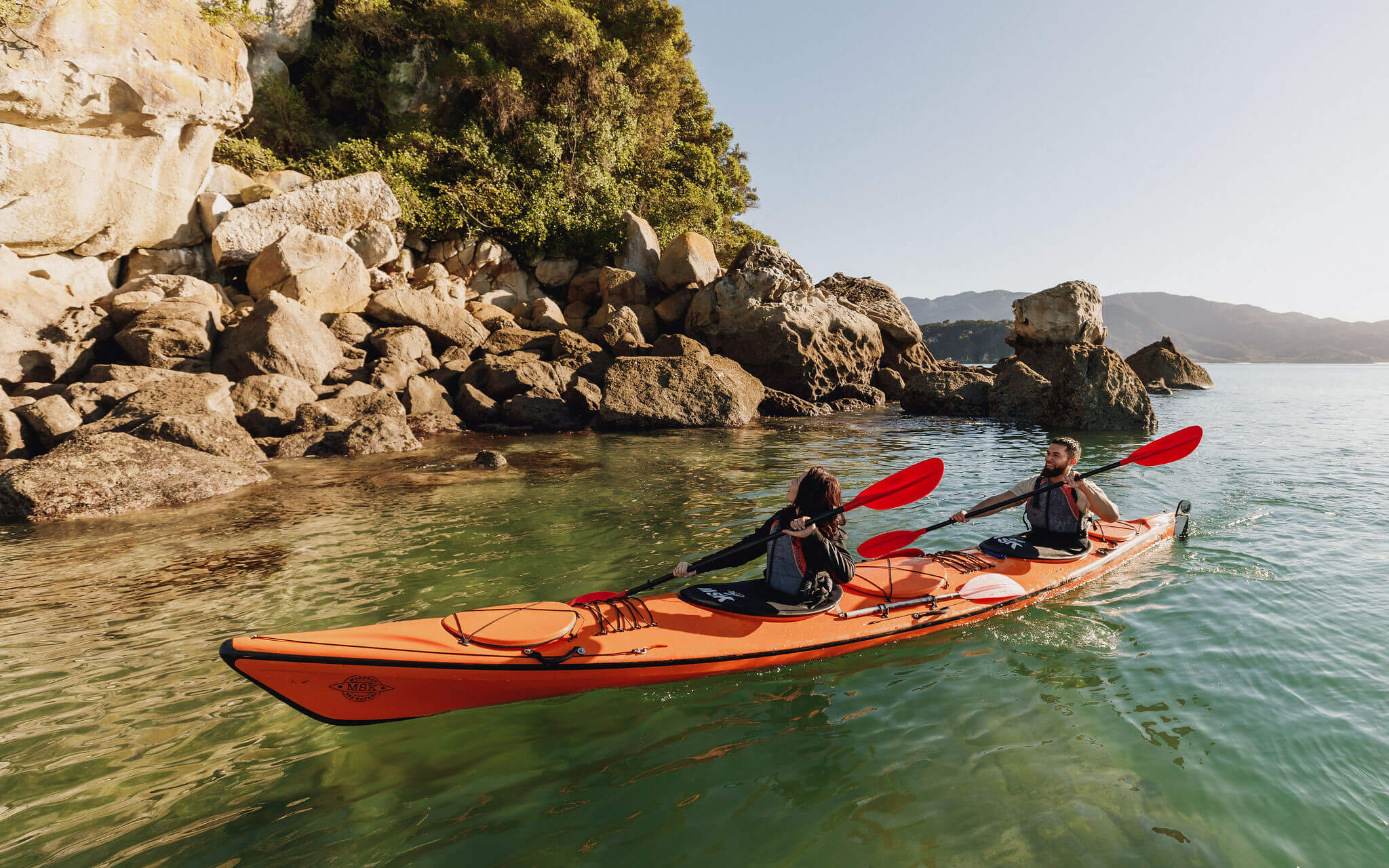 Zero Carbon - Couple kayaking Abel Tasman