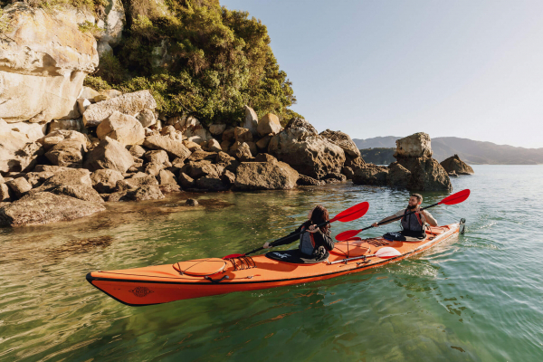 Zero Carbon - Couple kayaking Abel Tasman