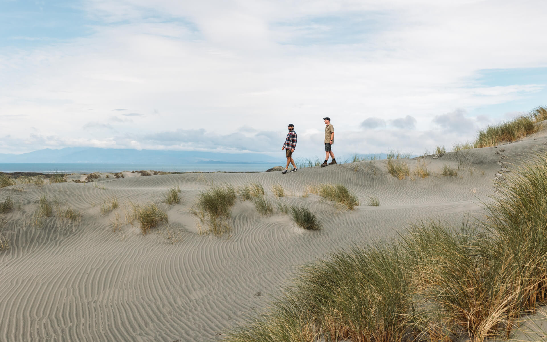 Mates walking at Farewell Spit
