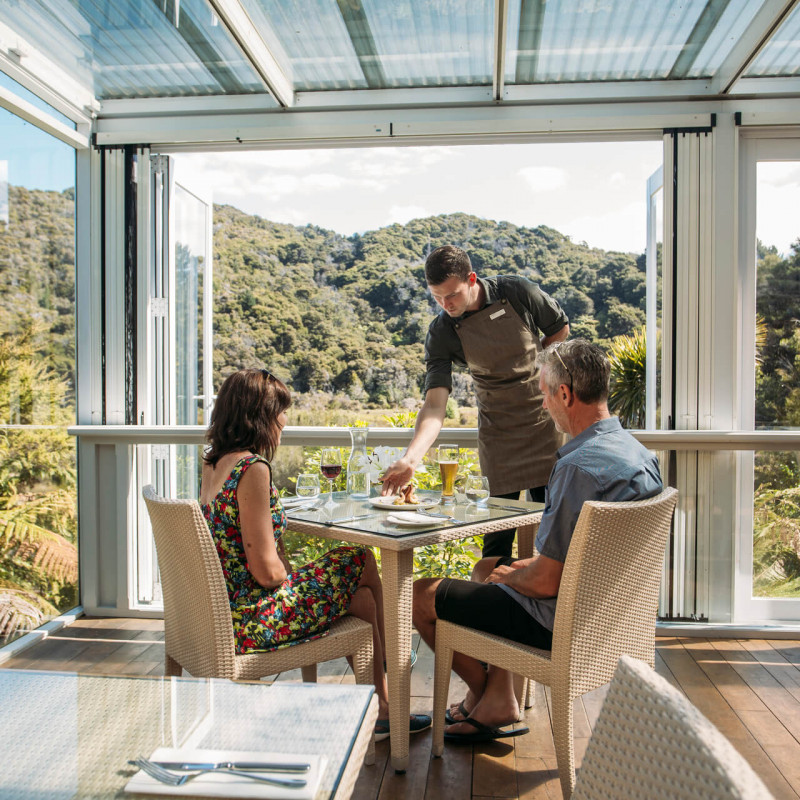 Couple dining at Awaroa Lodge Abel Tasman