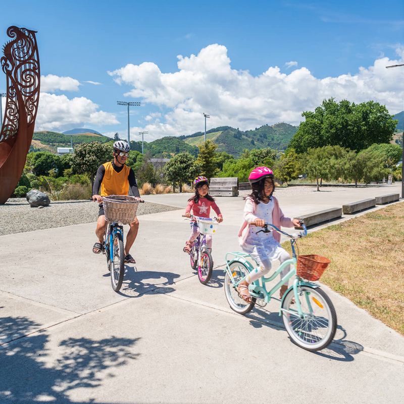 Family cycling around Nelson Matai River Walkway by Oliver Weber