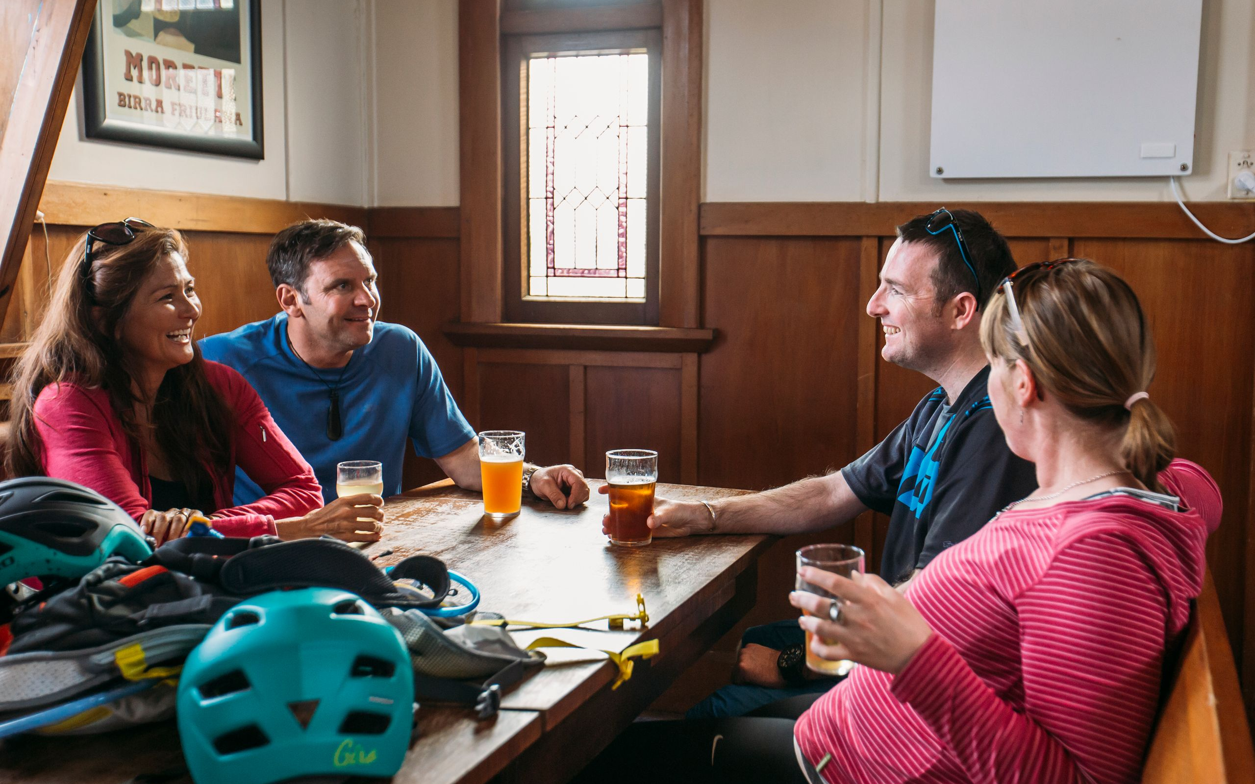 Cyclists mates drinking craft feer Free House Pub